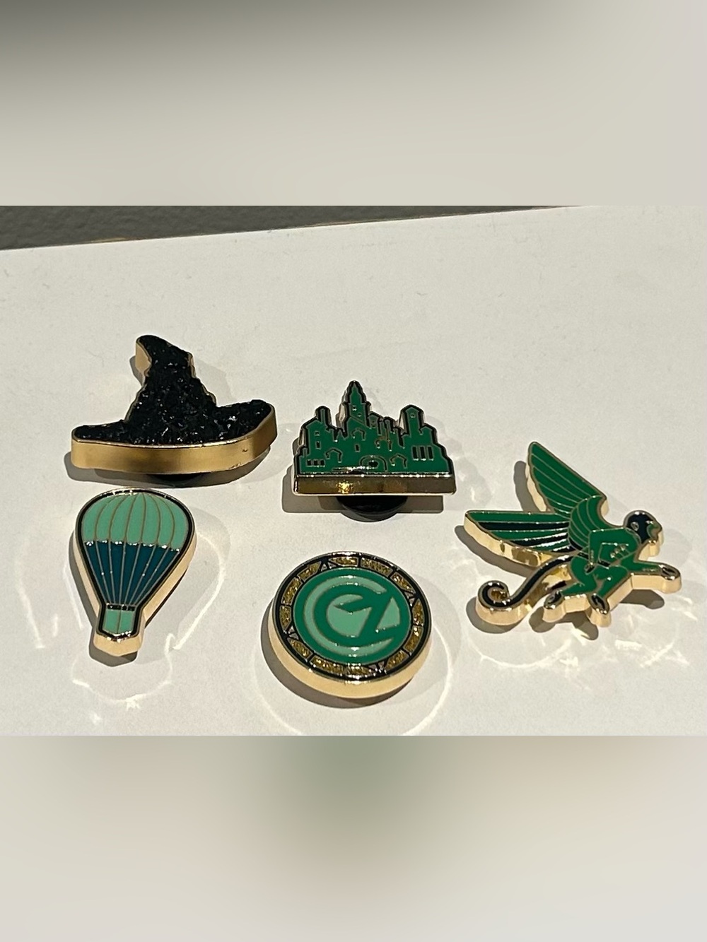 Five wizard of oz/wicked croc charms!